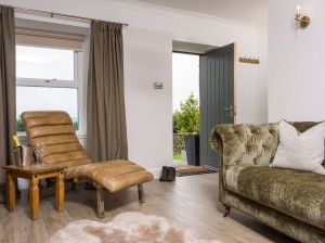 The Romantics ottoman and front door